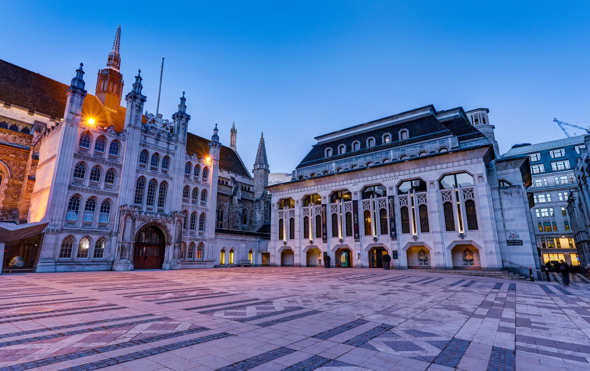 landscape image showing the outside of the Guildhall and Art Gallery at dusk