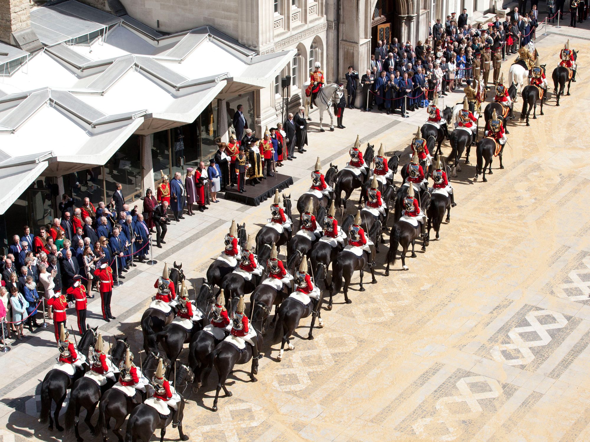 rows of royal guards on horses outside The Guildhall